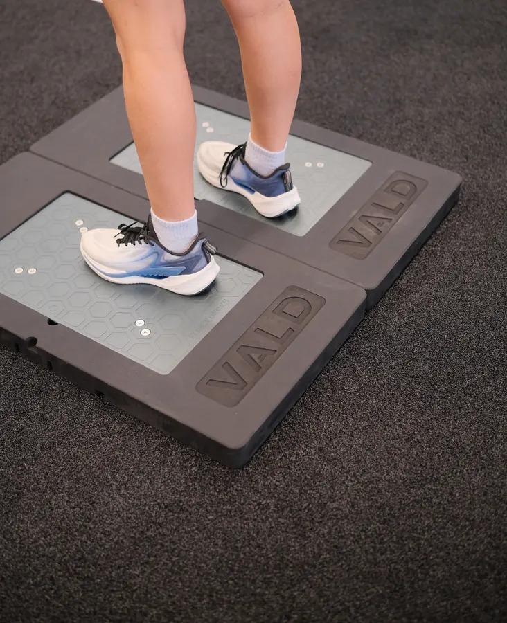 Close-up of an athlete's feet on VALD ForceDecks force plates